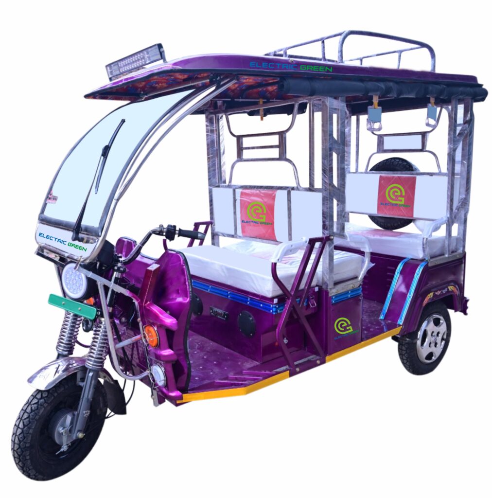 Electric green e rickshaw